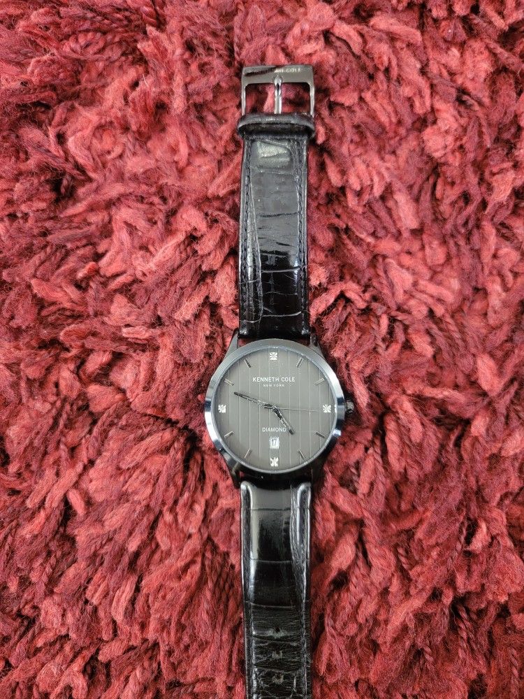 kenneth cole men watch with brand new battery. (MUST SELL TODAY!)