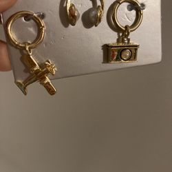 Three gold charms