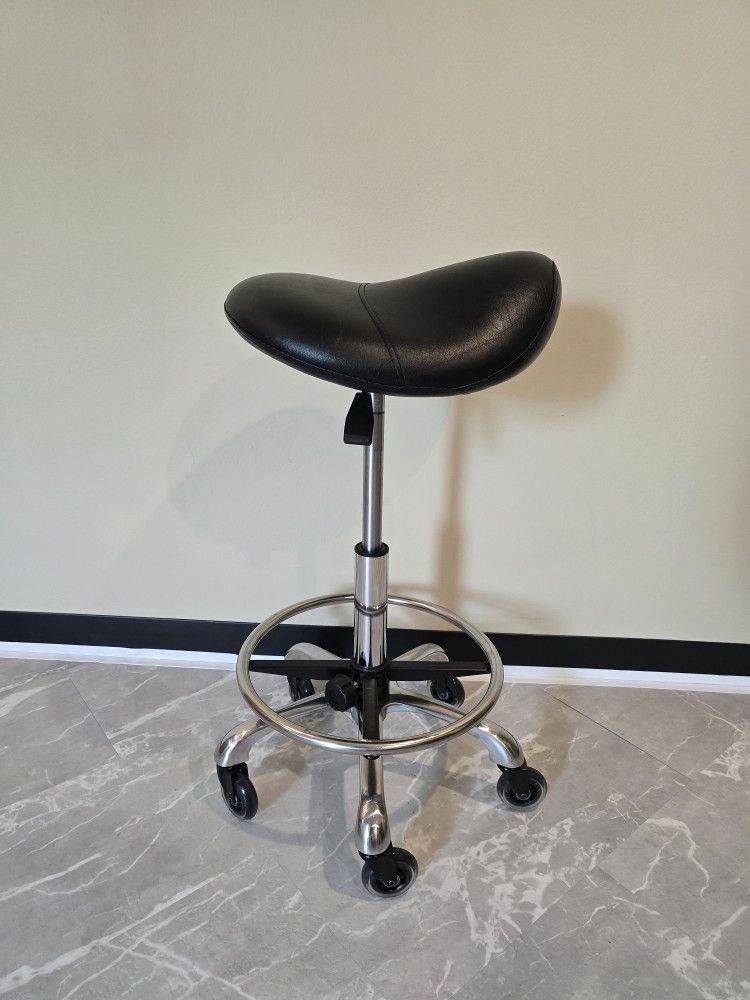 Two Adjustable Saddle Seats With Roller Blade Wheels