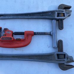 2 Ridgid 4-Wheel Pipe Cutter And Two Ridgid 18” Offset Aluminum Wrenches