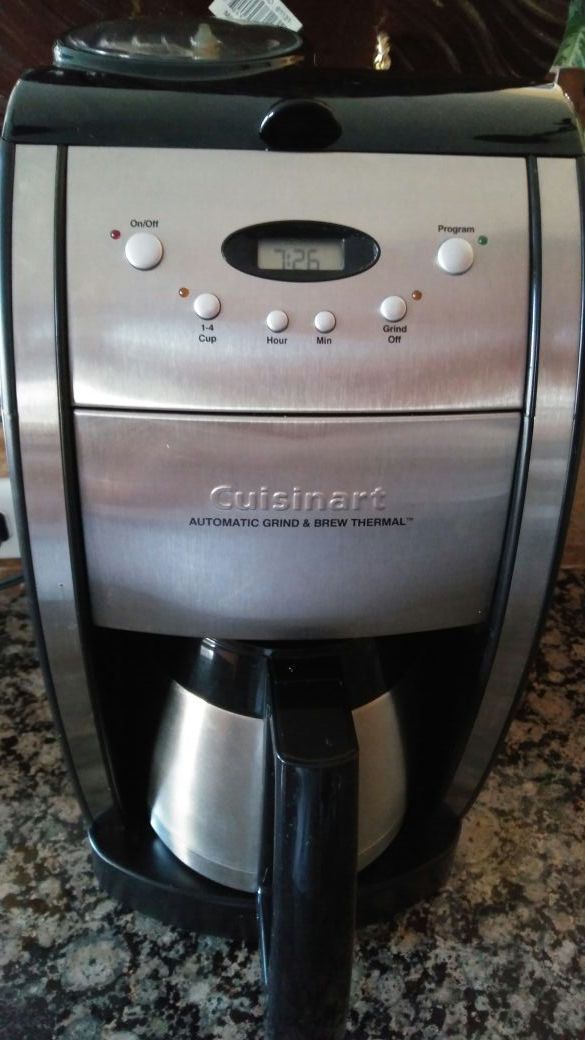 Coffee maker with grinder