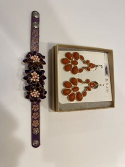 Earrings and leather bracelet