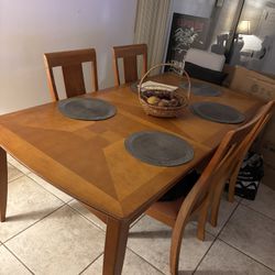 Solid Wood Dining Table with 4 Chairs – Good Condition