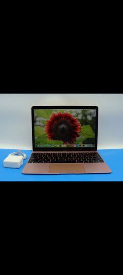 MacBook 12 inch rose gold in super good condition 8gb ram 250gb hardrive with charger