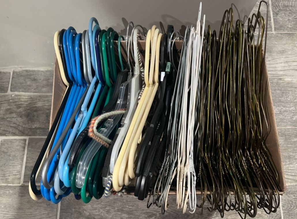 100 Clothes Hangers – Great Condition