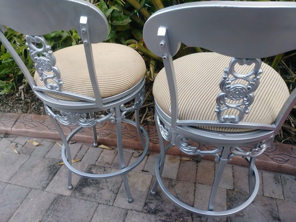 2 heavy steel bar stools