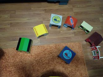 Kid craft wooden train track with wooden buildings