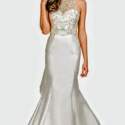 Stunning White Sleeveless Wedding Dress with Embroidered Top.