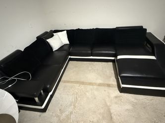 Black And White Sectional Sofa With Pillows