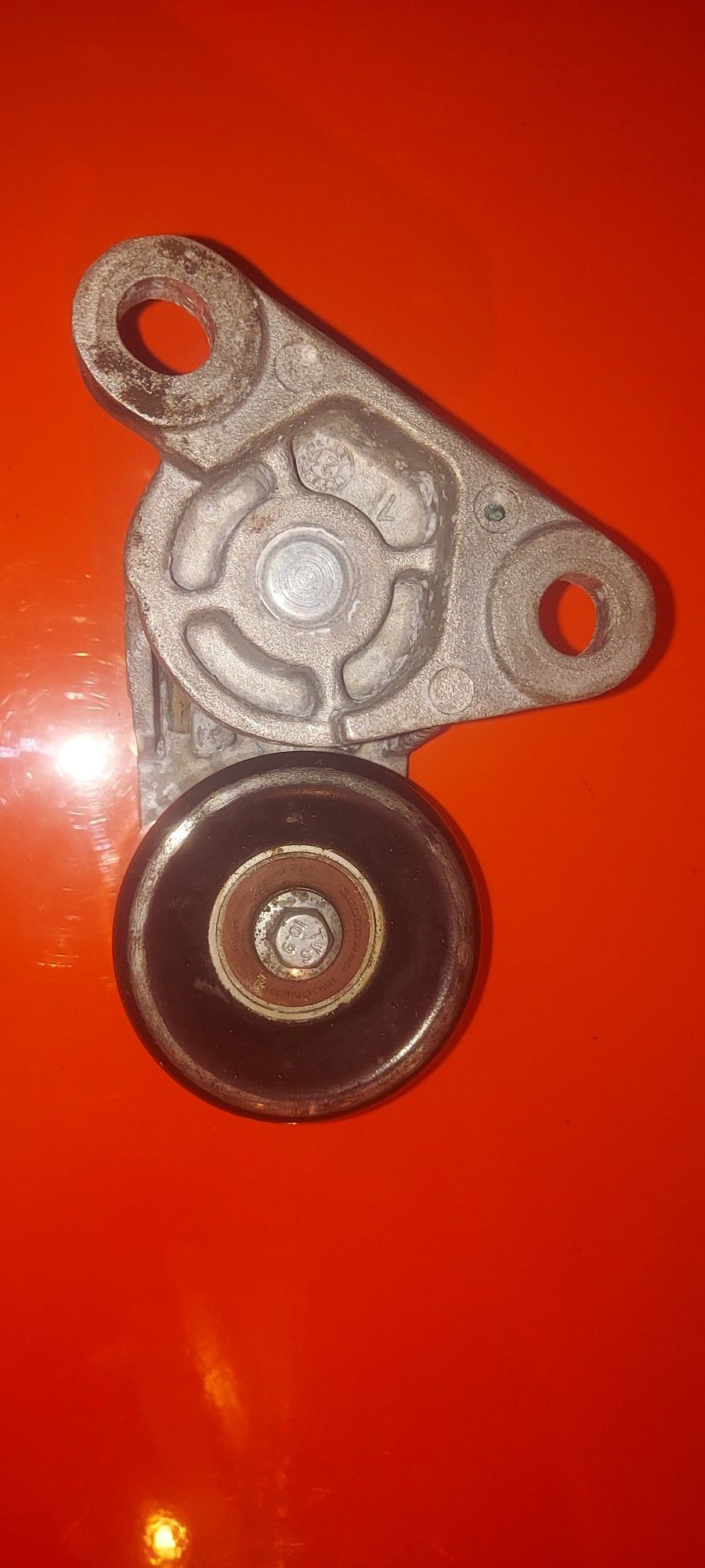 Belt Tensioner.