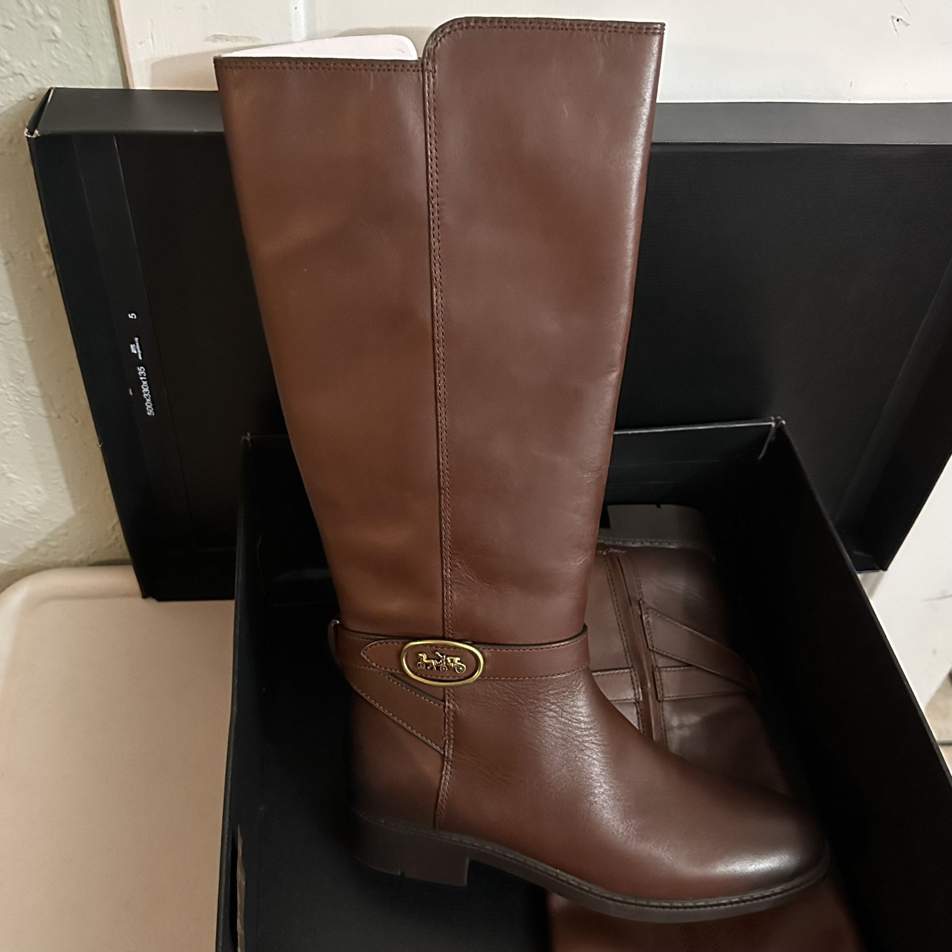 new coach boots Size 7