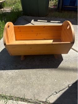 Wooden doll rocking cradle