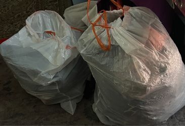 trash bag full of clothes