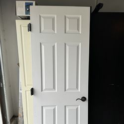 White Door With Black Handle
