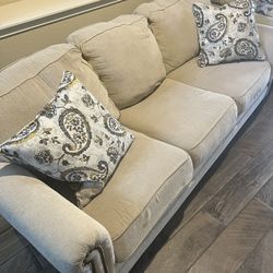 Beige Couch With Pillows