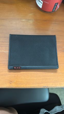 TUMI passport holder