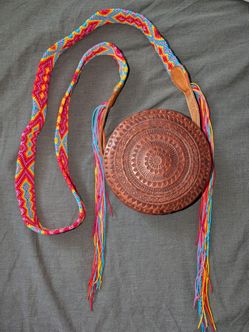 Handcrafted brown leather crossbody with woven strap