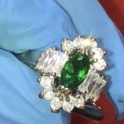 Marquis Cut Emerald On Silver With Diamonds Surrounded By A Attractive Diamond Accent 