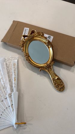 Gold mirror and lace fan