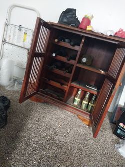 Solid wine and liquor cabinet