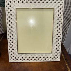Beautiful Lenox porcelain picture frame holds a 8 x10 photo