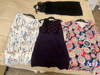Bundle of 4 woman’s dresses size 14 selling all together no individual pickup Gaithersburg md20877