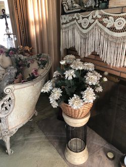 Pretty Yellow flowers in a Wicker Basket