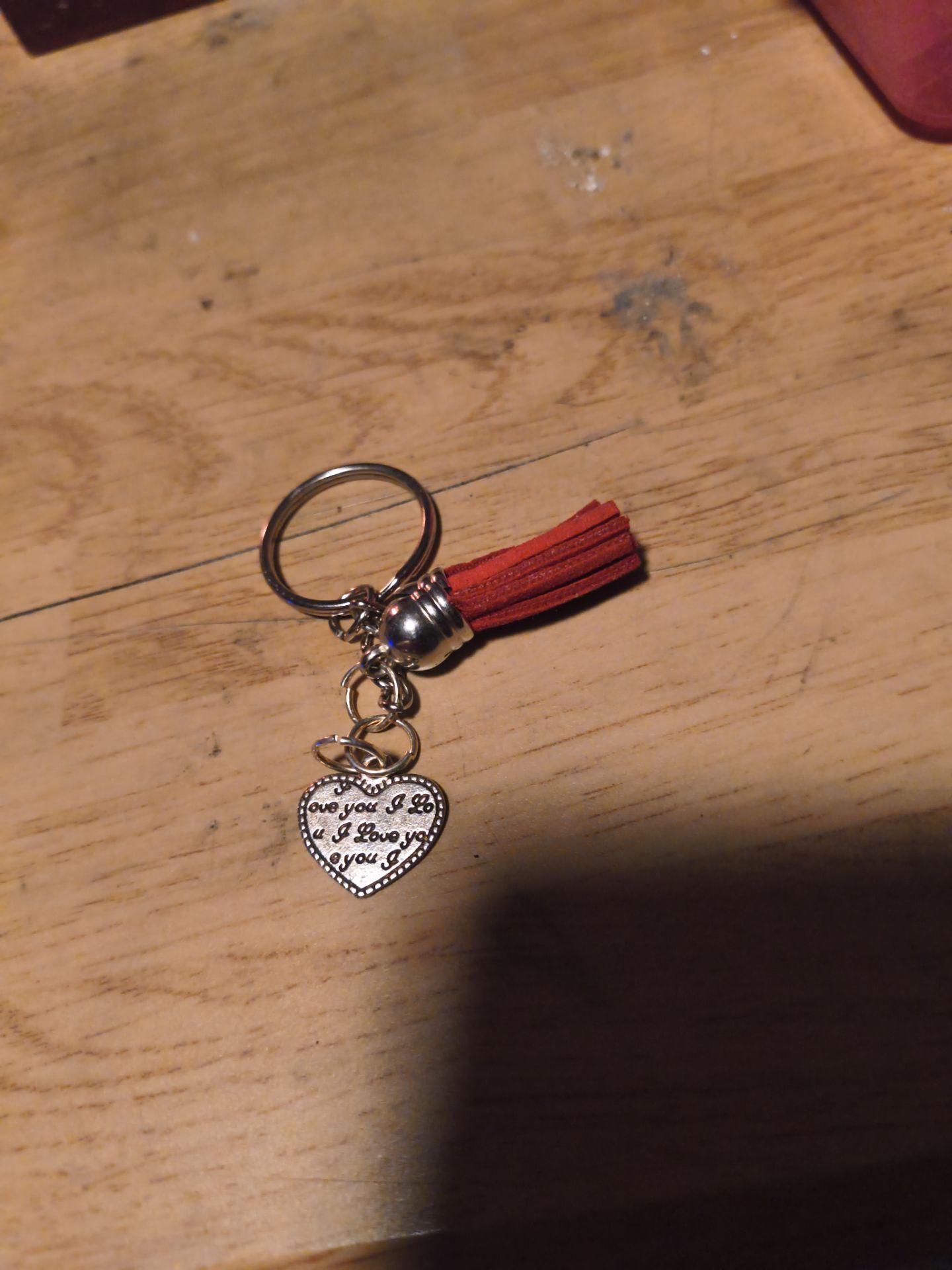 Keychain with tassel and inspirational phrase