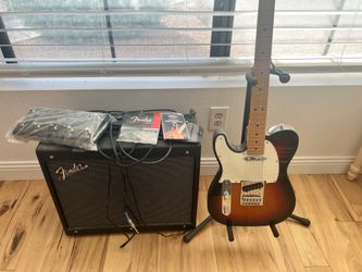 Left hand fender guitar with amp