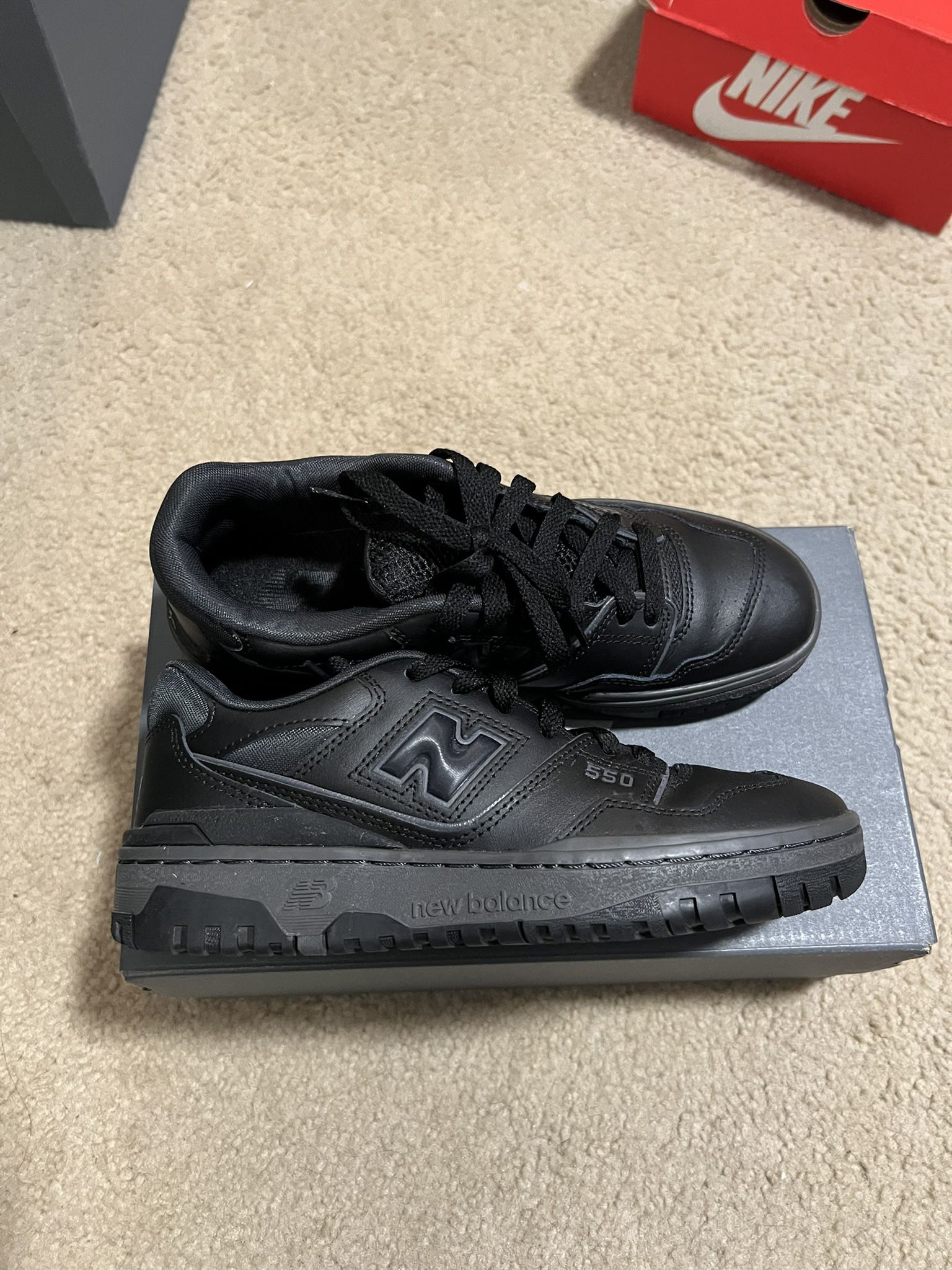 New Balance 550s triple black