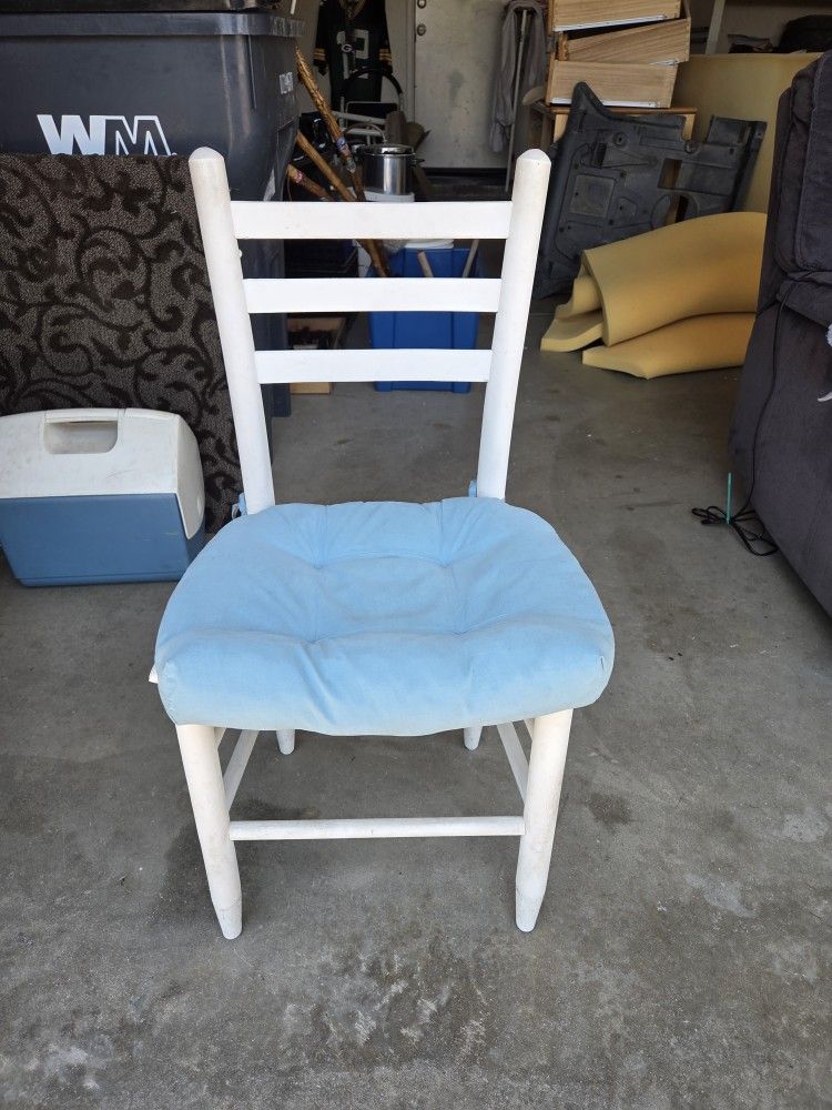 Charming White Wooden Chair with Light Blue Cushion