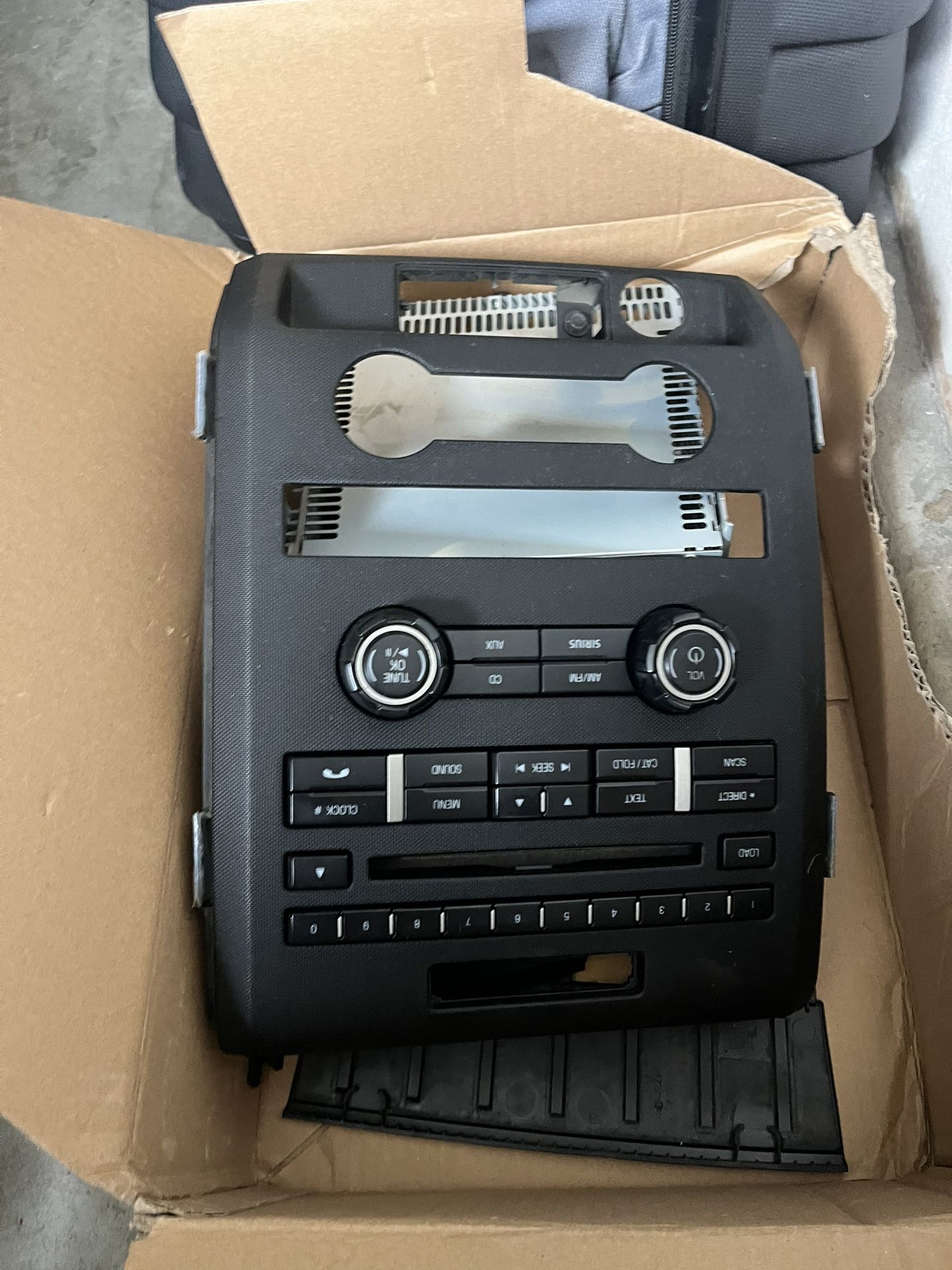 2011 Ford F150 OEM Cd Player And Radio With Plastic Mount