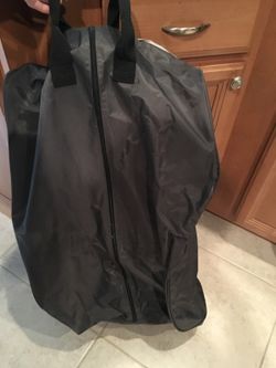 Traveling car seat holder on wheels