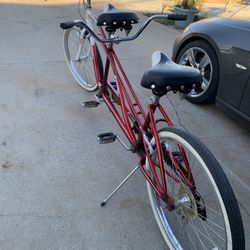Red Schwinn Tandem bike