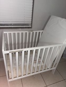 Mini Convertible Baby Crib — $40