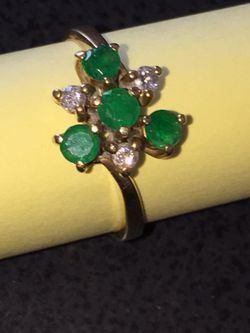 Emerald and diamond cluster ring