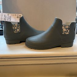ESMARA ladies ankle rain boots , brand new with tags  Gray color with flower pattern on each side. Size 8.5 US Slip on, very comfortable and pretty 