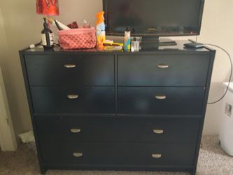 Black glass top chest of drawers with detachable mirror