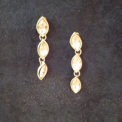 Monet Dangle earrings with goldish looking stones.