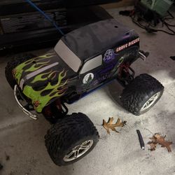 Traxxas Nitro Rc Car And A Bag Full Of Spare Parts