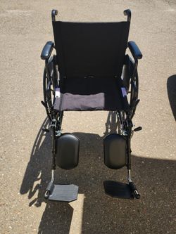 Black Manual Wheelchair with Leg Rests