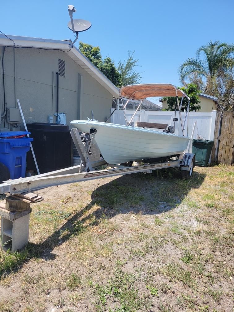 64’ Starcraft Boat WITH 20 Hp Motor & 14 Inch Aluminum Trailer 