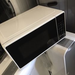 700 Watts Microwave  Only $33 Each Tax Included 