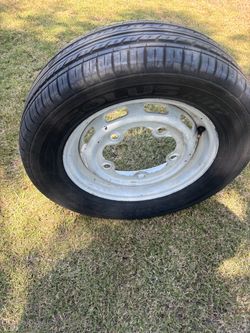 VW bug wide 5 spare rim 15in with Kuhmo 205 60 15 tire.