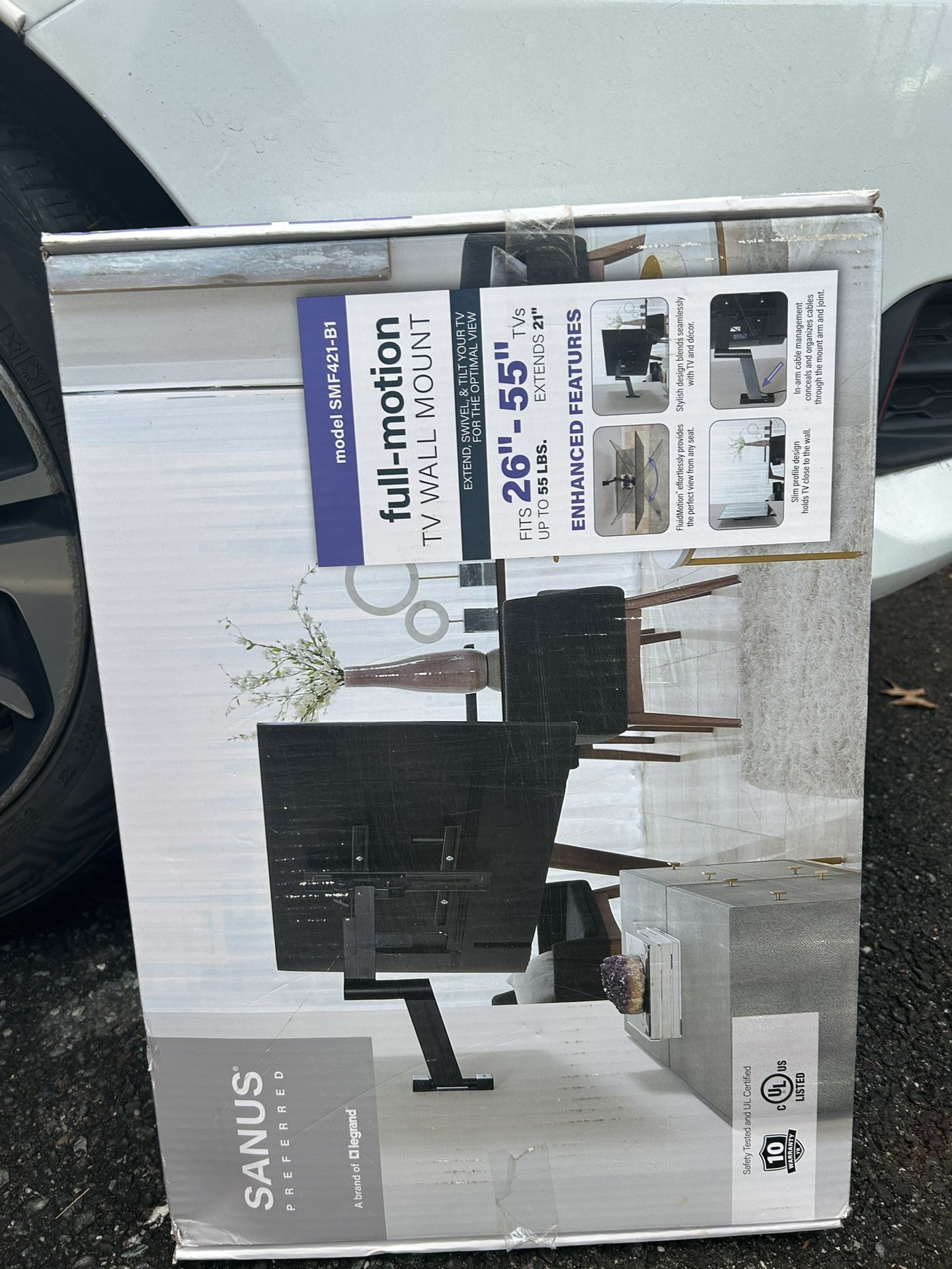 Full-motion TV wall mount