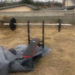 Workout Folding Bench, Olympic Size Barbell, 2 -45 Lbs Plates