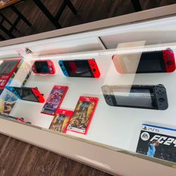 Nintendo Switch Oled and neon (games available)