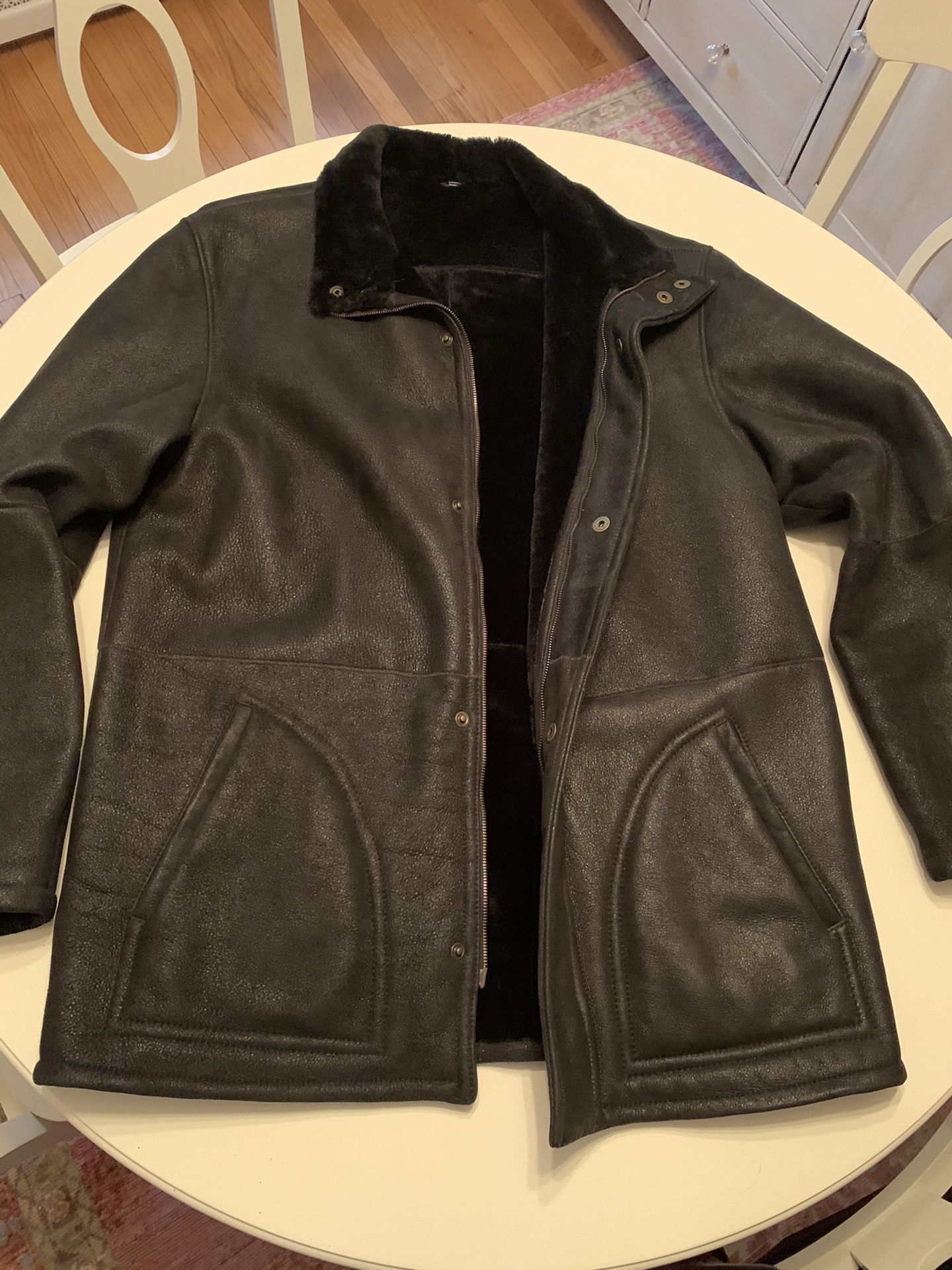 Barney’s shearling leather jacket. Sz large.