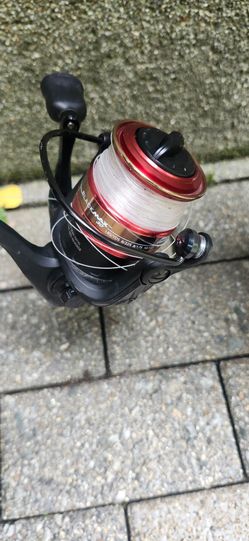 Abu Garcia Black Max 30 Spinning Reel and red ugly stick