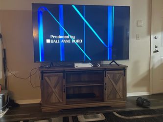 75 inch Hisense Roku TV and Entertainment center $350 OBO